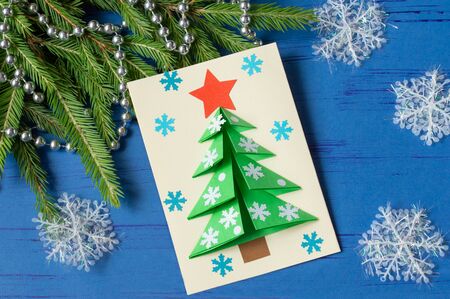 How to make Christmas card with Christmas tree. Original children's art project. DIY concept. Step-by-step photo instructions. Step 14. Final resultの写真素材