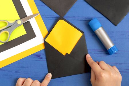 How to make original envelopes for Halloween greetings. Children's art project. DIY concept. Step-by-step photo instruction. Step 11. Make envelopeの写真素材
