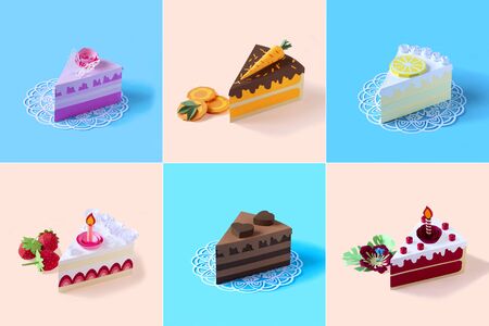 Set of varied pieces of cakes made of paper. Colorful collage of volumetric paper objects. Paper art and craft. Food art conceptの写真素材
