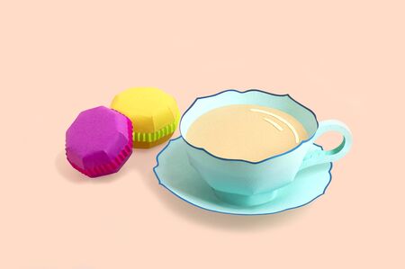 Paper cup with tea and two multi-colored macaroons. Popular french dessert for tea. Paper art and craft. Volumetric handmade paper objects. Minimal art food conceptの写真素材