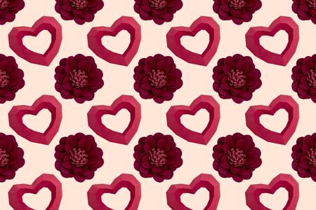 Beautiful holiday background with paper polygonal hearts and flowers. Colorful background for Valentine's day. Paper art and craft in holiday design. Volumetric handmade paper objectsの写真素材