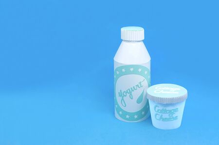Various dairy products made of paper. Paper boxes and bottles with yogurt and cottage cheese. Paper art and craft. Volumetric handmade paper objects. Minimal healthy eating conceptの写真素材