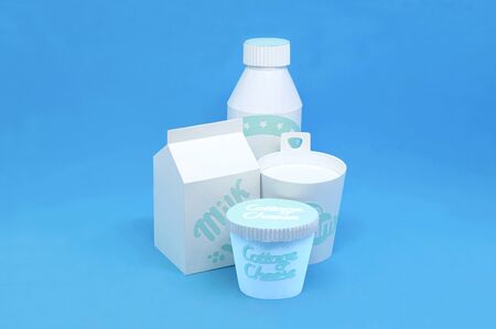 Various dairy products made of paper. Paper boxes and bottles with milk, yogurt, ice cream and cottage cheese. Paper art and craft. Volumetric handmade paper objects. Minimal healthy eating conceptの写真素材
