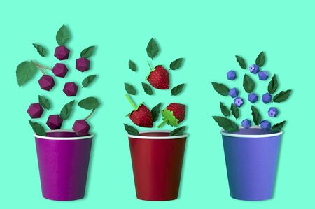 Paper berries and mint leaves fall in paper cup. Preparation of summer drinks. Paper craft and paper art. Real volumetric handmade paper objects. Minimal art food conceptの写真素材