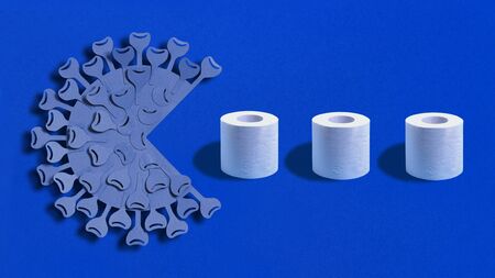 Coronavirus  attacks toilet paper. Hype of demand for toilet paper in connection with pandemic covid-19. Panic shopping as epidemic spreads around worldの写真素材