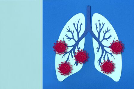 Pandemic covid-19. Damage to lungs by coronavirus. Complications during illness, life threatening. Real handmade paper objects. Minimal art medical conceptの写真素材