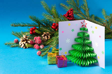 How to make Christmas card with volumetric tree. Original project for children. DIY concept. Step-by-step photo instructions. Step 10. Final resultの写真素材