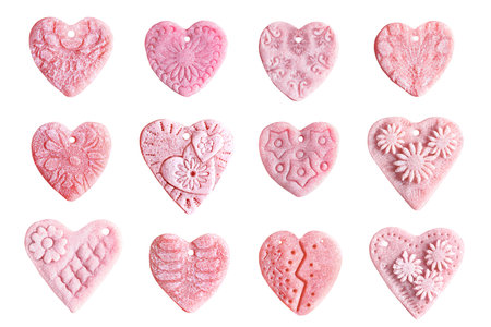 Set of pink vintage clay hearts isolated on white background. Valentine's day decorの写真素材