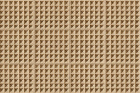 Kinetic sand texture for children's play and sculpting with geometric imprintsの写真素材
