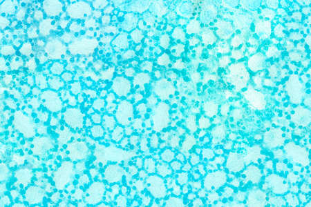 Abstract light blue background with stains of soap bubbles. Paper texture with effect of bubbles...