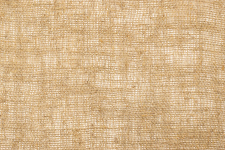 Abstract background from burlap woven from hemp. Rough thinned burlap textureの写真素材