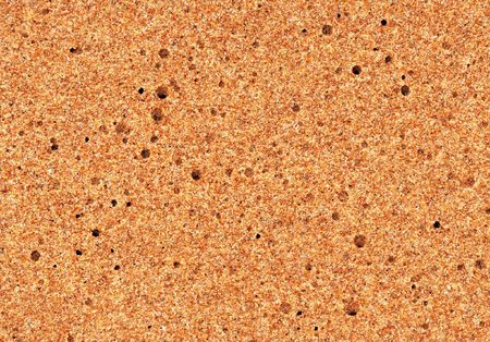 quartz sand on the beach with holes texture background