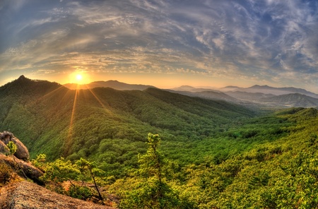 Fish-eye view of majestic sunset of the Russian Primorye mountains landscape HDR image の写真素材
