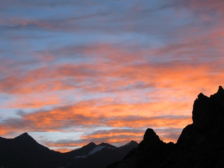 view of sunset in Bezenghi mountains at Caucasus の写真素材