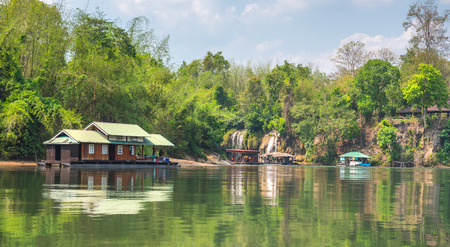 Tourism on the floating house rafting at the river Kwai, Kanchanaburi, Thailand.のeditorial素材