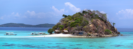 Sandbar with tourists and boats on the tropical Bulog Uno island, Palawan, Philippinesの写真素材