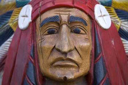 An old painted cigar store indian wood carving.の写真素材