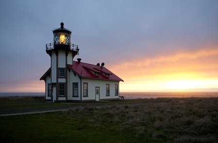 Sunset over the Pacific Ocean at Point Cabrillo Light Station near Caspar, Northern California,...