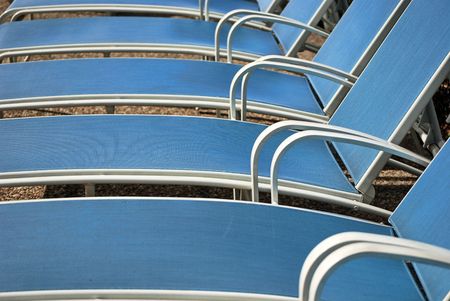 row of pool chairsの写真素材