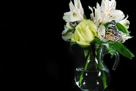  on a fresh bouquet of flowers.の写真素材