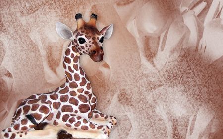 Cute giraffe statue on an abstact background.の写真素材