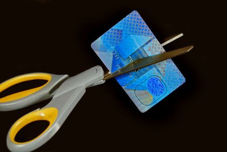 Scissors cutting up a credit card.の写真素材