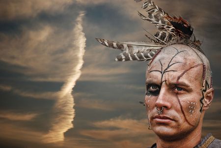 Proud young warrior at sunset.の写真素材