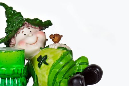 Irish leprechaun with a mug of green beer.の写真素材