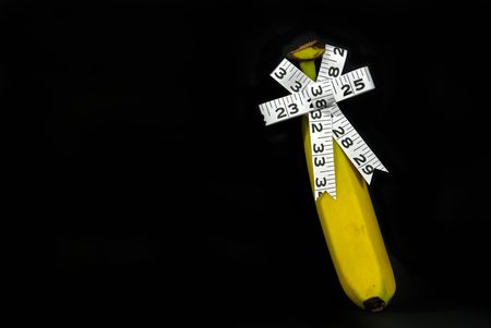Tape measure bow on single banana.