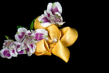 Solitaire diamond ring in a fortune cookie.の写真素材