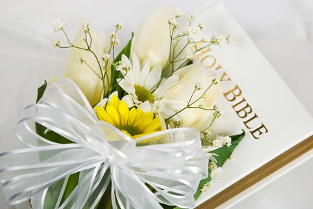 Spring wedding bouquet on Holy Bible.の写真素材