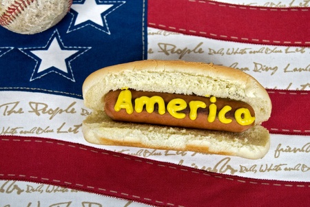 American flag with hot dog and baseball.の写真素材