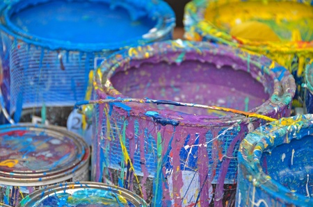 dried paint dripping on cans