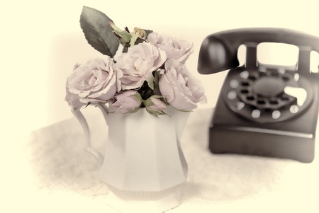 retro telephone with rose bouquet