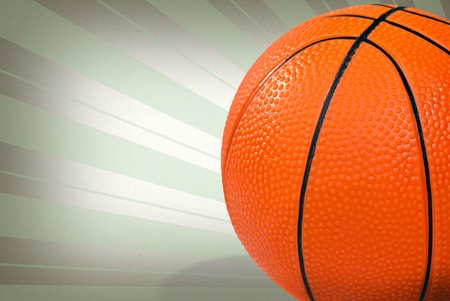 close up of a basketball on light beam backgroundの写真素材