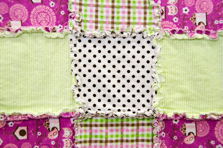 flannel patchwork quilt with frayed edge