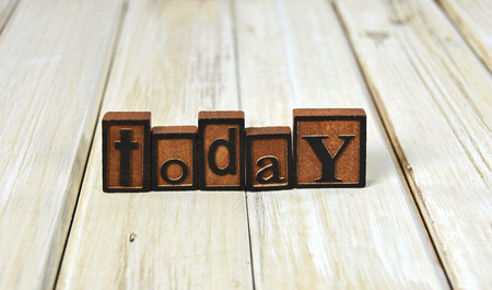 word today in vintage wooden letterpress type on woodの写真素材