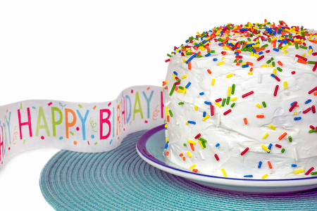 birthday streamer with cake and colorful candy sprinklesの写真素材