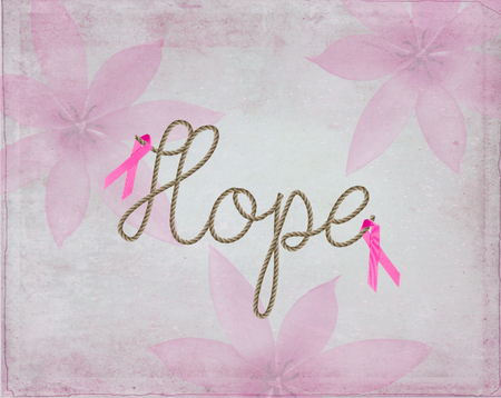 word hope in rope text with pink breast cancer awareness ribbon on textured floral backgroundの写真素材