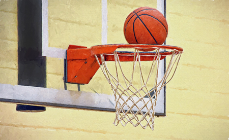 basketball in hoop and net with impressionistic effectの写真素材