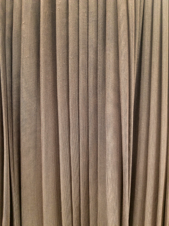 close up of brown pleated textured fabric