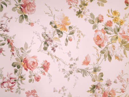 Pink floral pattern on old-fashioned wallpaper