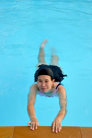 a woman swimsの写真素材