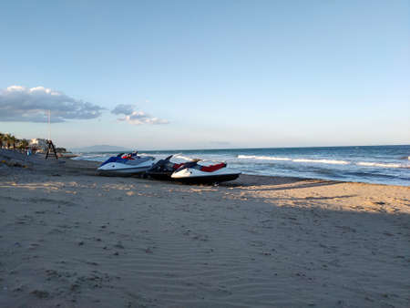 sea ââbeach and motor boats on itの写真素材