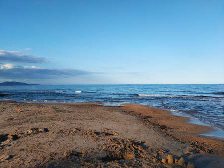 photo picture of the sea coast merging with the blue skyの写真素材