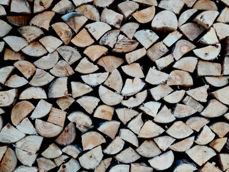 background stacked chopped firewoodの写真素材