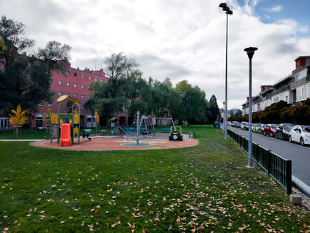 In autumn, an empty children's swingのeditorial素材