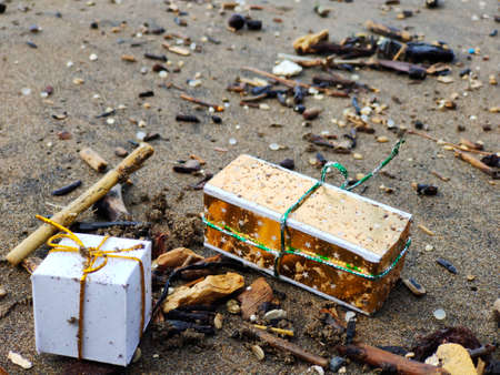 Christmas gifts by the sea after a stormの写真素材