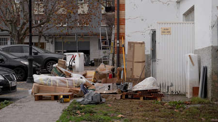 people throw furniture out of sunken houses after flooding in the city of Pamplona, ââDecember 12, 2021のeditorial素材