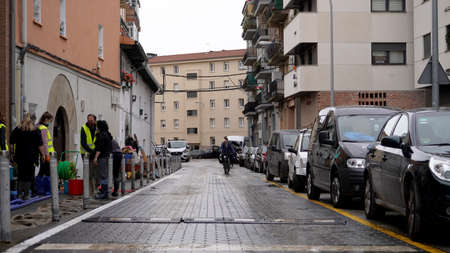 local residents with volunteers from Villava, Navarra region Spain pumping water out of living quarters, repairing damage after river flooding: Arga. December 12, 2021のeditorial素材